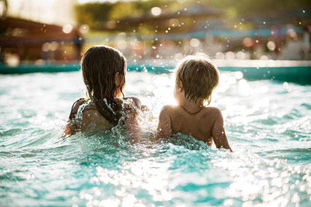 Kids swimming at resort pool